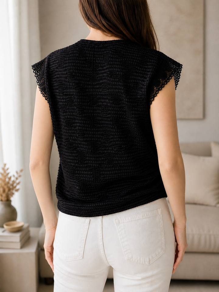blusa negra mujer espalda