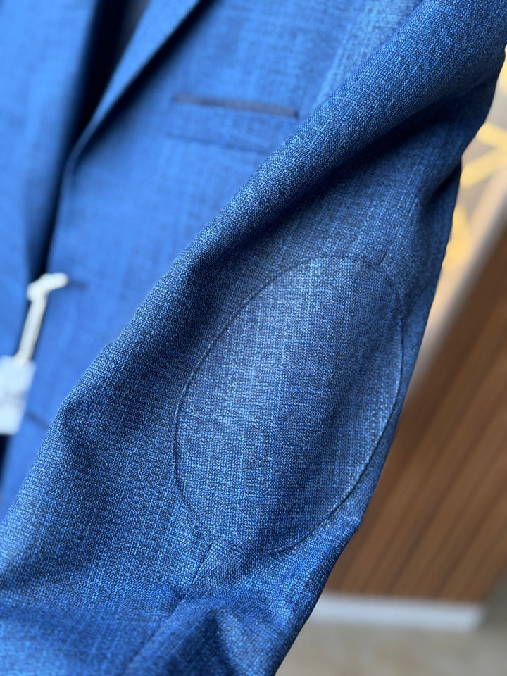 Traje azul texturizado