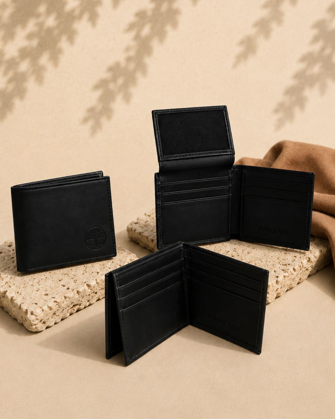 Conjunto de vistas de billetera ejecutiva negra de cuero mostrando diseño exterior e interior.