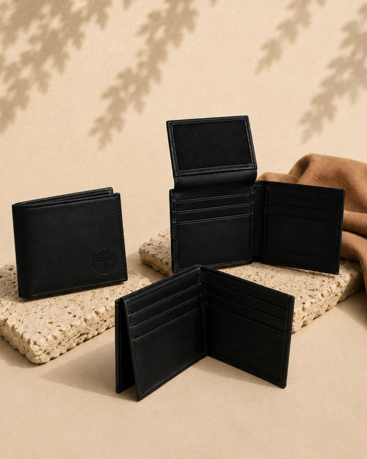 Conjunto de vistas de billetera ejecutiva negra de cuero mostrando diseño exterior e interior.